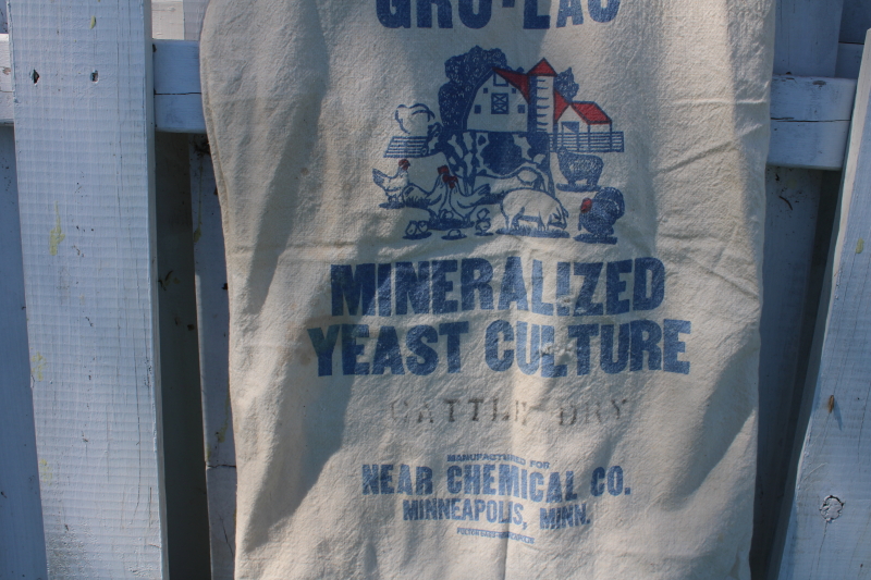 photo of vintage feed sack w/ red & blue farm animals barn print advertising graphics #2