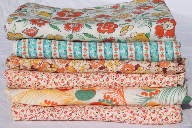 photo of vintage feedsack fabric, shades of orange print cotton florals collection mixed prints #1