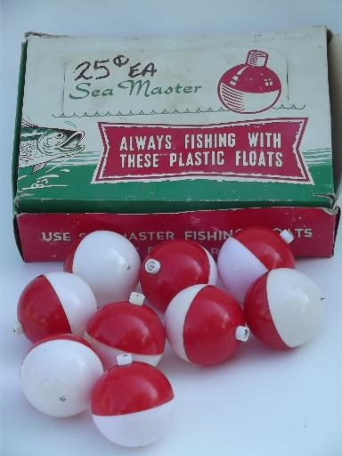 photo of vintage fishing floats in original box, big red and white plastic bobbers #1