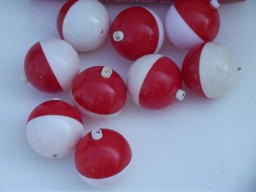 photo of vintage fishing floats in original box, big red and white plastic bobbers #2