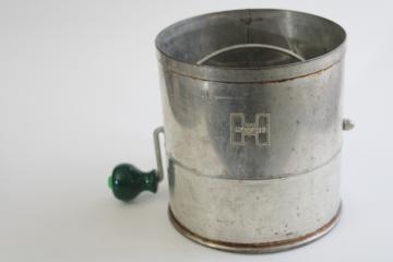 catalog photo of vintage flour sifter, big H Hodges hand crank sifter w/ green painted wood handle