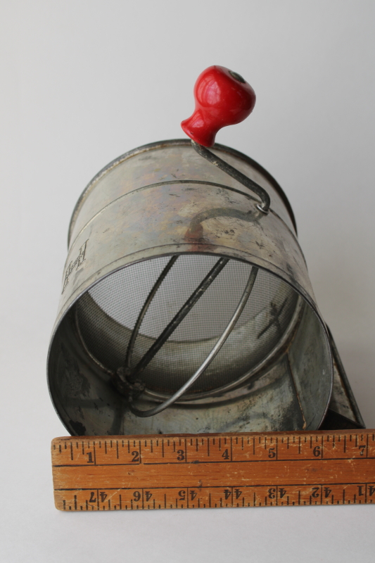 photo of vintage flour sifter, big H Hodges hand crank sifter w/ red painted wood handle  #4