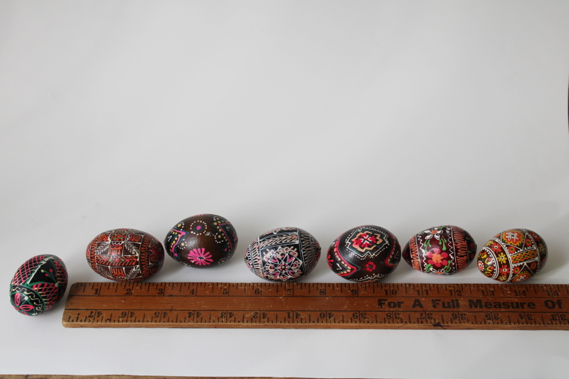 photo of vintage folk art, hand painted wooden Easter eggs, dark brown & black w/ bright colors #7