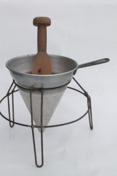 catalog photo of vintage food mill, tripod stand w/ strainer sieve cone & wood masher pestle