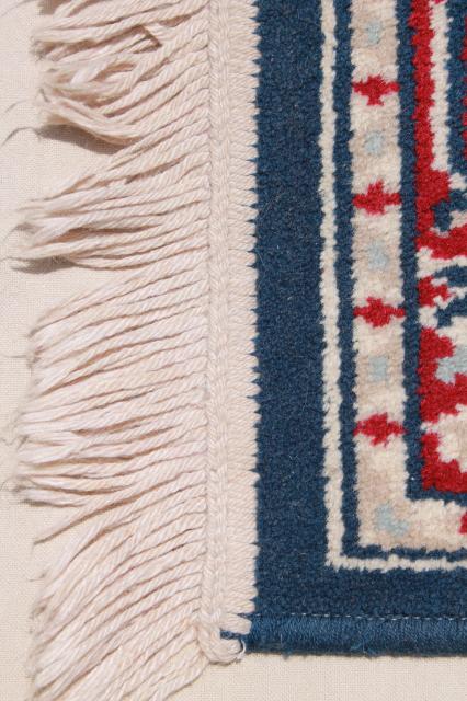 photo of vintage fringed wool area rug, small oriental carpet woven red & white on navy blu #10