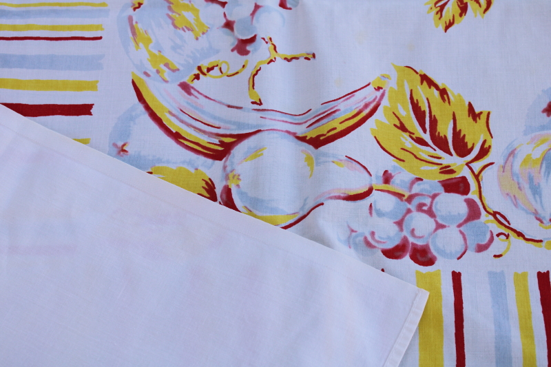 photo of vintage fruit print cotton tablecloth, yellow, red, light blue striped border, mid century kitchen #5