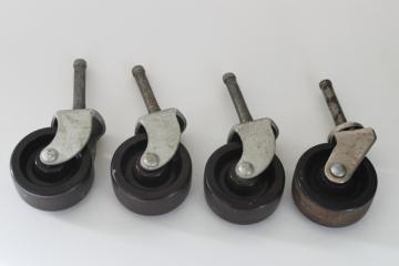 vintage furniture or light industrial pin style casters, sturdy steel w/ brown bakelite wheels 