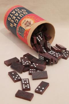 catalog photo of vintage game parts, old wood dominoes, Quaker Oats can full of wooden dominos