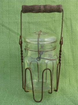 catalog photo of vintage glass bail lid fruit jar in old wirework carrier rack w/ wood handle