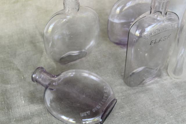 photo of vintage glass bottles w/ old sun purple color, antique flasks pocket liquor bottle lot #3