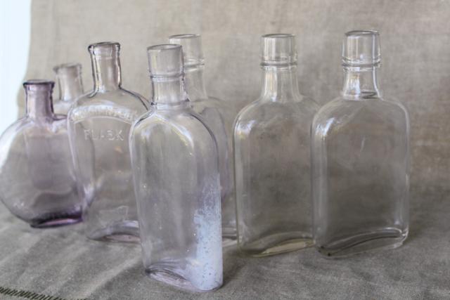photo of vintage glass bottles w/ old sun purple color, antique flasks pocket liquor bottle lot #5