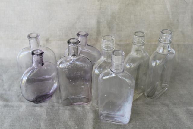 photo of vintage glass bottles w/ old sun purple color, antique flasks pocket liquor bottle lot #6