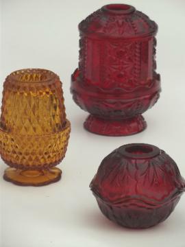 catalog photo of vintage glass candle lamps, amber glass & ruby red fairy light lanterns