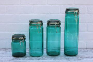 catalog photo of vintage glass canisters set, teal green french canning jars w/ wire closures hermetic seal lids