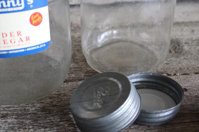 photo of vintage glass jars w/ wire bail handles, primitive old vinegar bottles w/ paper label #8
