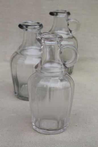 photo of vintage glass jug bottles, lot of old glass syrup jugs or vinegar cruets #1