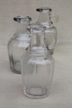 catalog photo of vintage glass jug bottles, lot of old glass syrup jugs or vinegar cruets