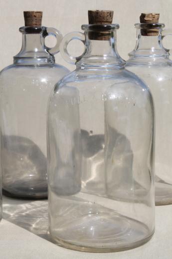 photo of vintage glass jugs, half gallon jug bottles for syrup, vinegar or home brewing #3