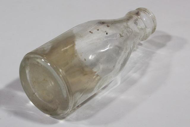 photo of vintage glass medicine bottle w/ old paper label Alder St pharmacy Portland Oregon #5