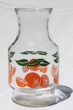 catalog photo of vintage glass orange juice bottle, oranges print glass refrigerator pitcher carafe