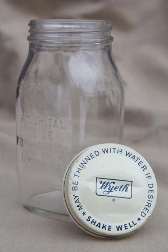 photo of vintage glass pharmacy medicine bottle embossed Wyeth hospital use half-pint jar #3