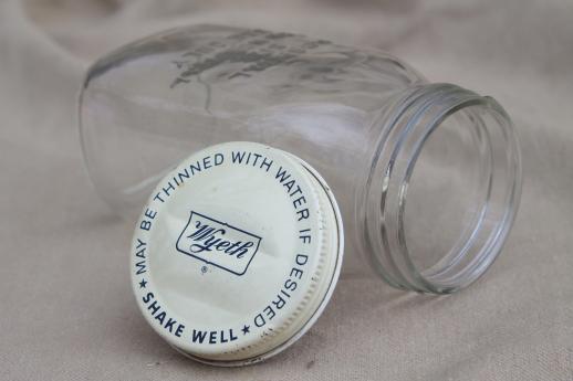 photo of vintage glass pharmacy medicine bottle embossed Wyeth hospital use half-pint jar #5