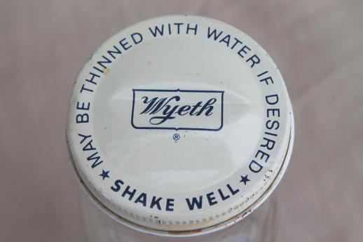 photo of vintage glass pharmacy medicine bottle embossed Wyeth hospital use half-pint jar #7