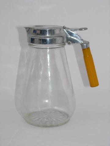 photo of vintage glass syrup pitcher, carmel bakelite handle #1