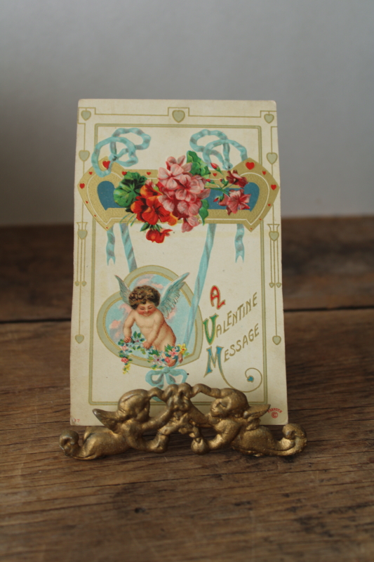 photo of vintage gold cherubs wire easel picture holder stand w/ antique Valentine postcard #1