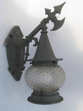 catalog photo of vintage gothic handwrought style metal porch sconce light, wall bracket lamp