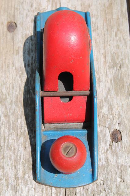 photo of vintage hand block plane, old woodworking tool shave wood planer w/ red & blue paint #2