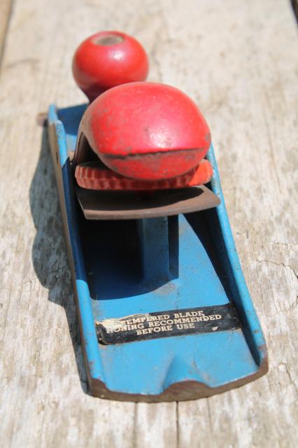 photo of vintage hand block plane, old woodworking tool shave wood planer w/ red & blue paint #4