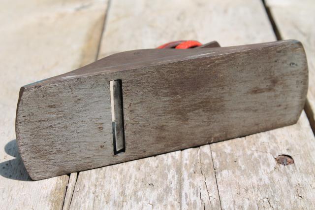 photo of vintage hand block plane, old woodworking tool shave wood planer w/ red & blue paint #5