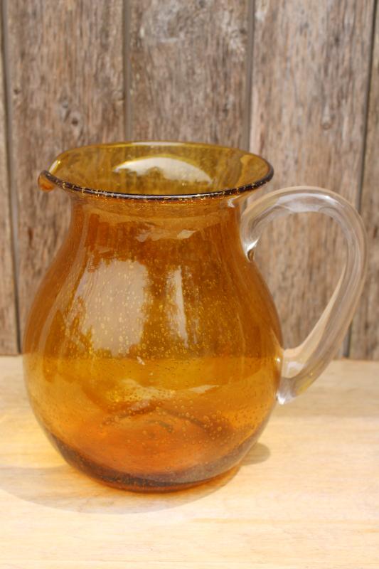 photo of vintage hand blown bubble glass pitcher, rustic golden brown amber glass jug #1