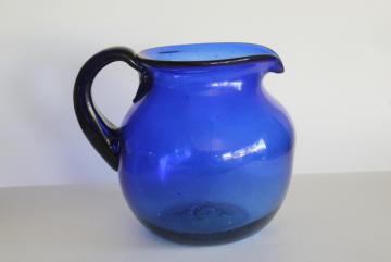 catalog photo of vintage hand blown glass pitcher, cobalt blue Mexican glass large jug