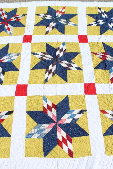 photo of vintage hand stitched cotton quilt, big lone star blocks red, blue, mustard yellow  #6