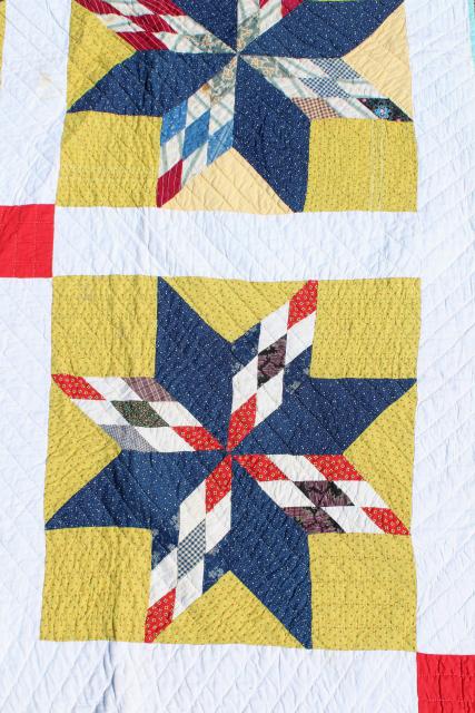 photo of vintage hand stitched cotton quilt, big lone star blocks red, blue, mustard yellow  #8