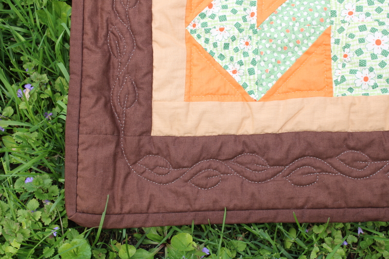 photo of vintage hand stitched handmade patchwork quilt, all cotton fabrics brown w/ mid century prints, retro colors  #10