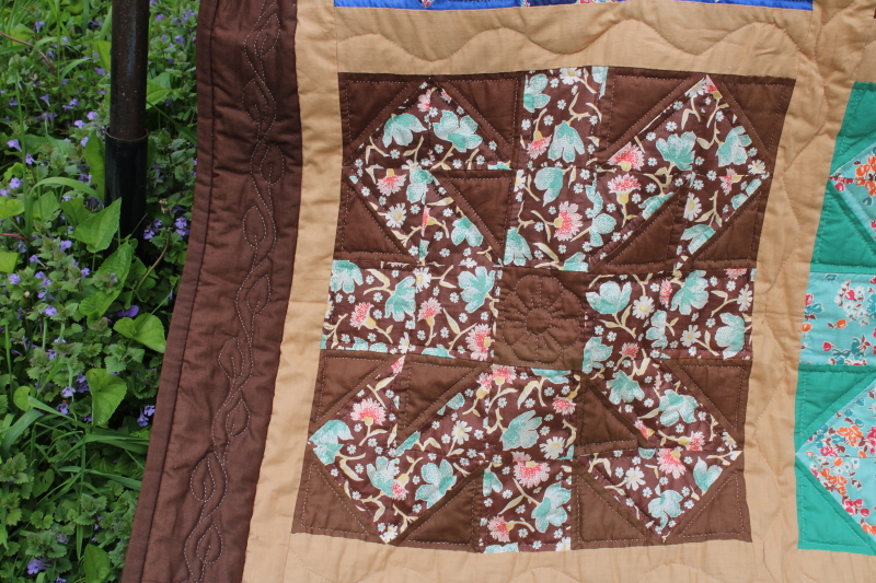 photo of vintage hand stitched handmade patchwork quilt, all cotton fabrics brown w/ mid century prints, retro colors  #11