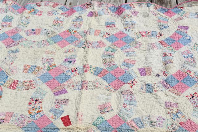 photo of vintage hand stitched wedding ring quilt, feed sack fabric w/ cotton prints #11