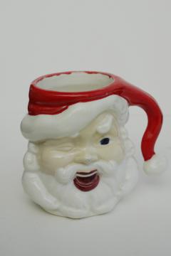 catalog photo of vintage handmade ceramic Santa mug, winking Santa, retro Christmas decor