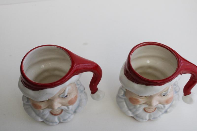 photo of vintage handmade ceramic Santa mugs, winking Santas, retro Christmas decor #5