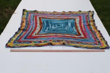catalog photo of vintage handmade crochet throw or shawl, soft light stretchy wrap or mini blanket, rainbow colors 