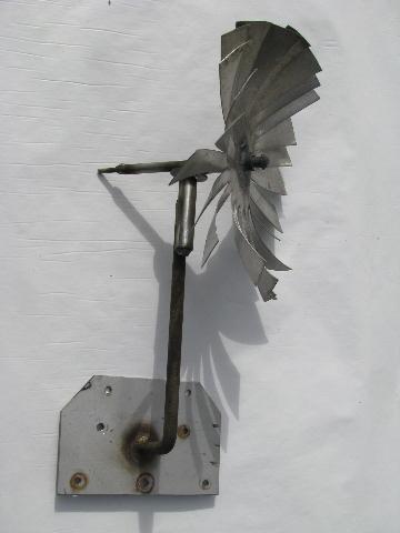 photo of vintage hand-made metal folk art windmill whirligig or weathervane #1