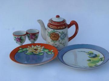 catalog photo of vintage hand-painted Japan chinaware, porcelain egg cups, teapot, plates