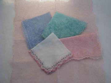 catalog photo of vintage hankies lot, sheer cotton in spring pastels w/ butterflies etc.