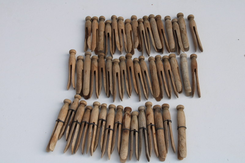 photo of vintage hardwood clothespins, clothes peg type lot old wire wrapped clothes pins #1