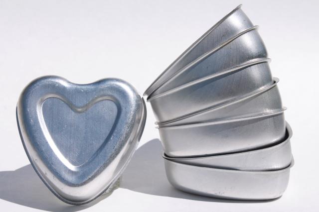 photo of vintage heart shaped aluminum baking pans for individual cakes or jello molds Valentine hearts #1