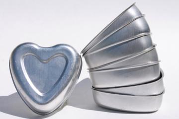 catalog photo of vintage heart shaped aluminum baking pans for individual cakes or jello molds Valentine hearts