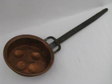 catalog photo of vintage heavy copper escargot pan w/ long iron handle